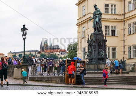 Tourist Along The Charles Bridge