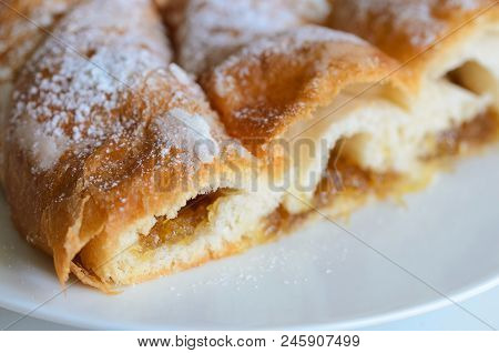 Ensaimada  is coil-shaped flaky pastry  from Mallorca, Balearic Islands.  This is one of the most ic