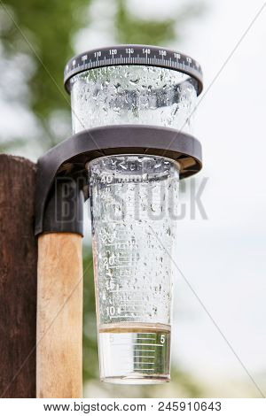 Meteorology With Rain Gauge In Garden