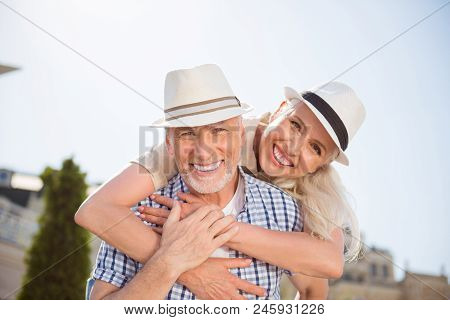 My Sweetheart! Portrait Of Cheerful Positive Couple With Beaming Smiles In Straw Hats, Attractive Ma
