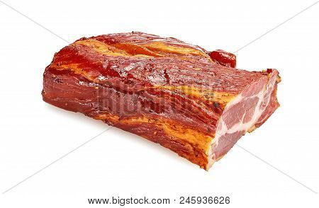 A Piece Of Meat Balyk With A Crust Of Spices And Sesame Seeds On A Cutting Board