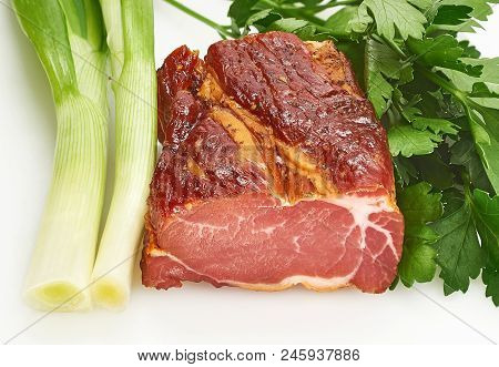 Pieces Of Pork Balyk With Fresh Green Lettuce On The White