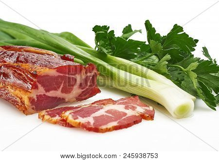 Pieces Of Pork Balyk With Fresh Green Lettuce On The White