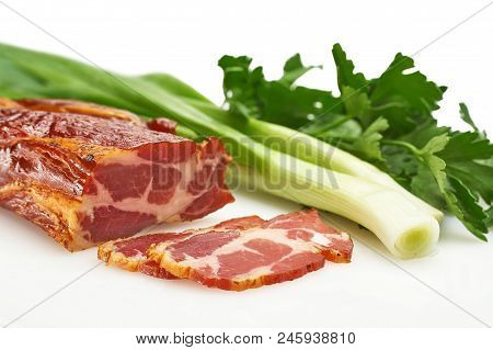 Pieces Of Pork Balyk With Fresh Green Lettuce On The White
