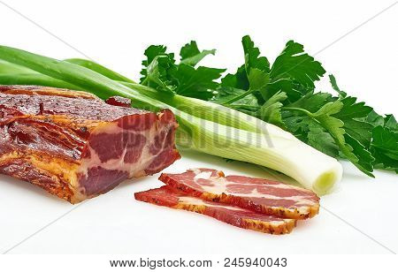Pieces Of Pork Balyk With Fresh Green Lettuce On The White