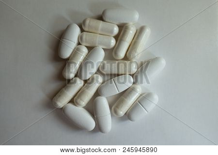 Some White Capsules Of Magnesium Citrate And Caplets Of Calcium Citrate From Above