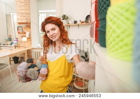 Craftswoman Shopping. Stylish Young Beautiful Craftswoman Wearing Bright Yellow Shirt And Striped Sh