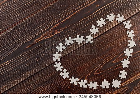 Blank Cardboard Puzzles Forming Heart Shape. Shape Of Heart Made From Jigsaw Puzzles, Copy Space. Va