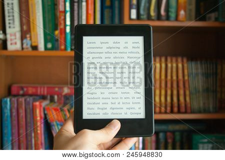 E-book In Man's Hand With Lorem Ipsum Text