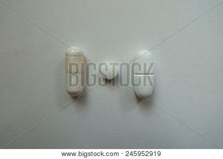 View Of Magnesium Citrate Capsule, Vitamin K2 Tablet And Calcium Citrate Caplet From Above