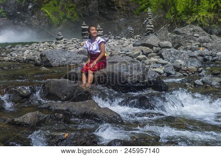 Batad, Philippines - May 02 : Girl From Ifugao Minority Near A Waterfall In Batad The Philippines On