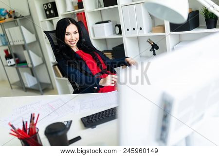 Portrait Of A Young Girl In A Suit. Beautiful Girl Is Working In The Office.