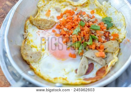 Hot Pan Fried Egg Stuff With Minced Pork And Sausage