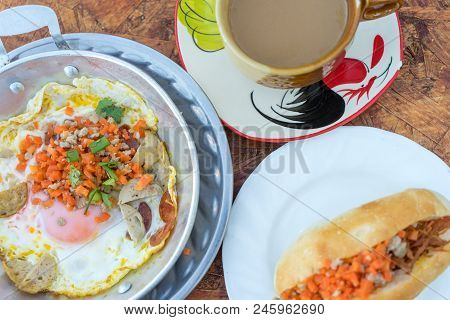 Hot Pan Fried Egg Stuff With Minced Pork And Sausage