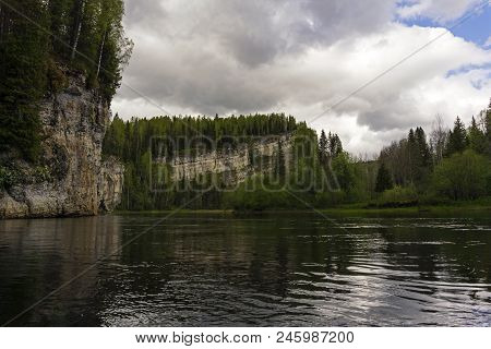 Landscape - River With Beautiful Rocks On Wooded Shores On A Cloudy Day
