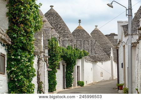 Unique Small South Italia City Alberobello With Antient Stones Conical Houses Trullo, Tourist Destin