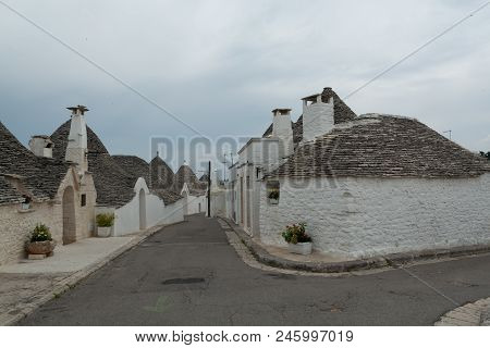 Unique Small South Italia City Alberobello With Antient Stones Conical Houses Trullo, Tourist Destin