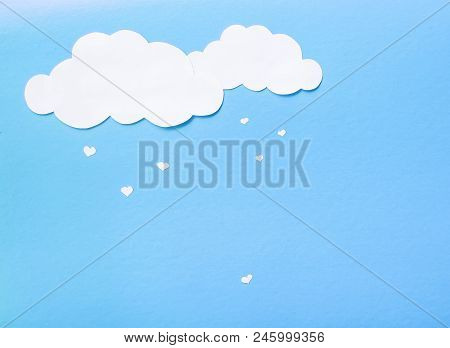 Paper Clouds From Which The Paper Hearts Fall.