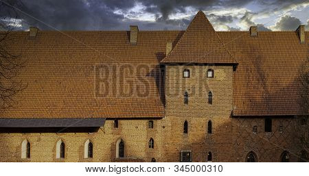 Malbork, Pomerania, Poland - January 2: Sunrise Over Castle Of The Teutonic Order In Malbork - The L