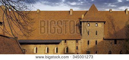 Malbork, Pomerania, Poland - January 2: Sunrise Over Castle Of The Teutonic Order In Malbork - The L