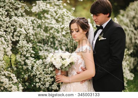 Handsome Groom Staind In Front Of Beutiful Bride