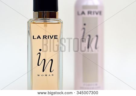La Rive In Woman Deodorant And Perfume Bottles On Beige Background. La Rive S.a. Is One Of The Leadi
