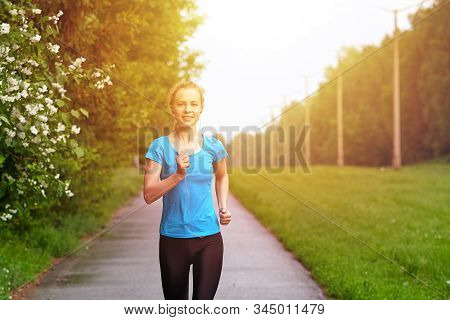 Running Woman Atletic Spotsman Training In The Summer Park. Outdoor Fitness Portrait