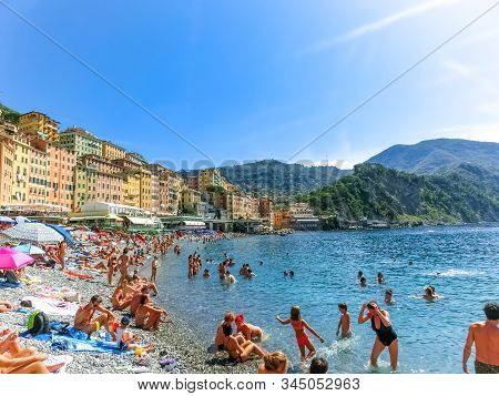 Camogli, Italy - September 15, 2019: People Resting At Beach At Camogli On Sunny Summer Day, Liguria