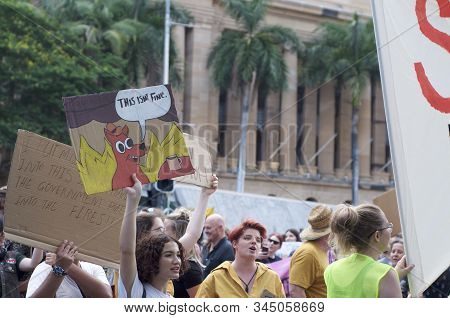 Brisbane, Queensland, Australia - 10th January 2020 : A Woman Holds A Sign Protesting Government Ina