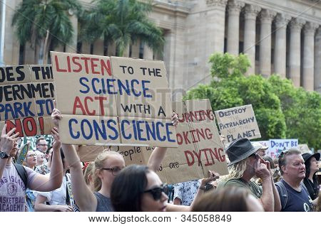 Brisbane, Queensland, Australia - 10th January 2020 : A Woman Holds A Sign Protesting Government Ina