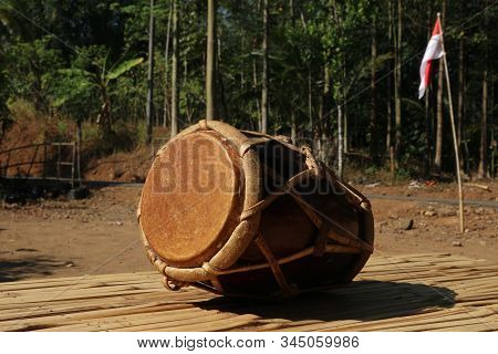 Dholak, A Traditional Musical Instrument On A Bamboo Bench