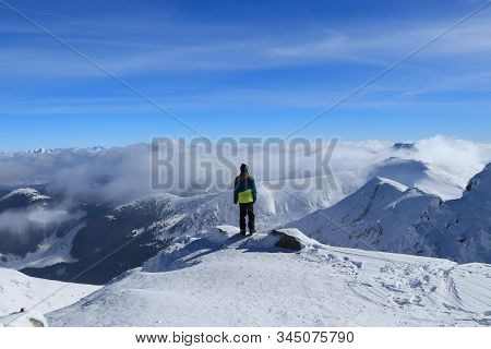 Magical Panorama On Peak Of Chopok With View To High Tatras And Dumbier. Young Skier Enjoy Freedom A