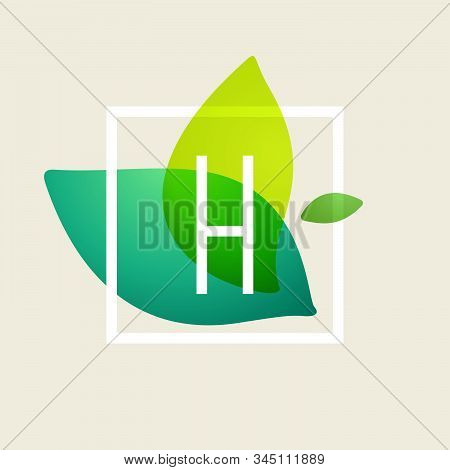 H Letter Logo In Square Frame At Green Leaves Watercolor Background. Vector Ecology Typeface For Bot