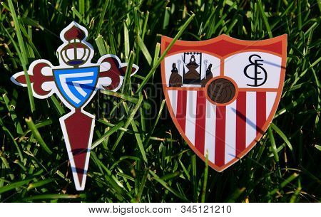 September 6, 2019, Madrid, Spain. Emblems Of Spanish Football Clubs Celta Vigo And Sevilla On The Gr