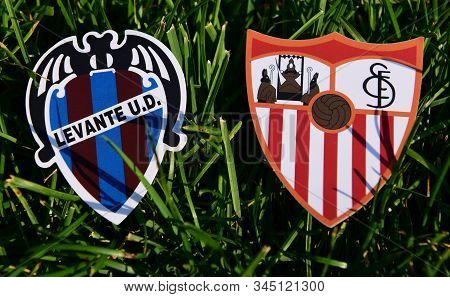 September 6, 2019, Madrid, Spain. Emblems Of Spanish Football Clubs Sevilla And Levante On The Green