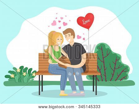 Couple In Love Cuddling In Park. Pair Sitting On Wooden Bench Talking And Hugging. Passionate Feelin