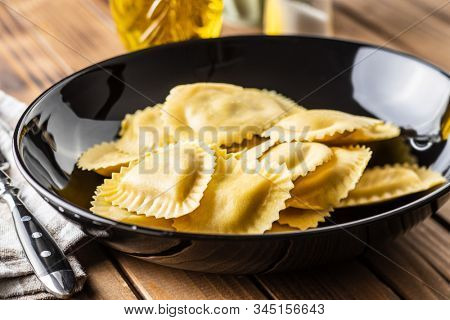 Italian stuffed pasta. Panzerotti pasta in plate.