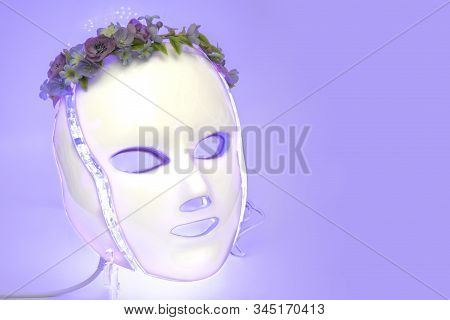 Color Therapy Mask Glowing Purple With Flower Crown On Lilac Backfround