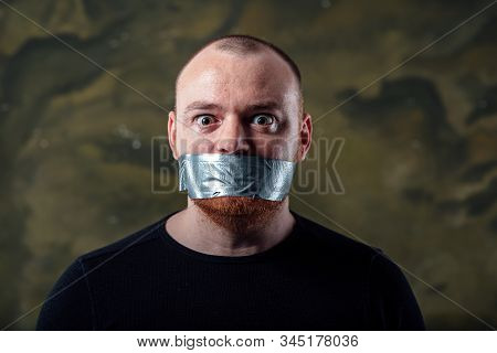 Scared Man. Mouth Is Sealed Grey Tape. Censorship In Society. Freedom Concept. Caucasian Man.