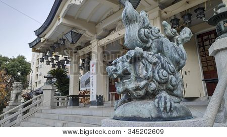 Osaka, Japan- 02 Dec, 2019: Stone Lions Guardian Statue In Namba Yasaka Shrine In Osaka, Japan