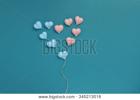 Ten Small Meringues Of Pink And Blue Hearts Are Laid Out In Big Heart With With Rope Made Of Natural