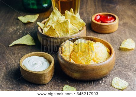 Table Fof Tasty Snacks And Beer Prepared For Watching Sports On Tv. Selective Focus