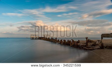 Dilapidated Old Fishing Dock Collapsing Into The Sea In Pak Nam Pran On The Gulf Of Thailand In Thai