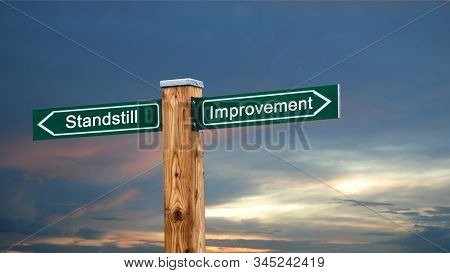 Street Sign The Direction Way To Improvement Versus Standstill