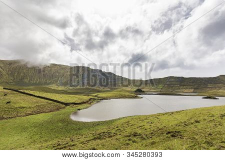 Rock Walls In The Distance Of The Corvo Caldera On The Island Of Corvo In The Azores, Portugal.