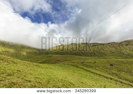 Clouds Move Into The The Corvo Caldera On The Island Of Corvo In The Azores, Portugal.