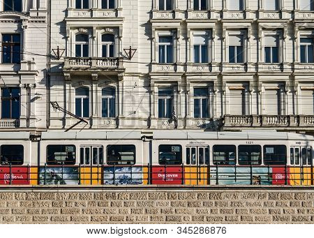 Budapest, Hungary - January 5, 2020: A Colorful Tram Passes In Front Of The Historic Buildings On Id