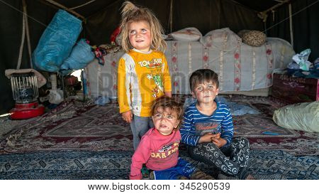Shiraz, Iran - May 2019: Qashqai Turkish Nomadic Children Inside A Tent. The Qasqhai Are Nomadic Peo
