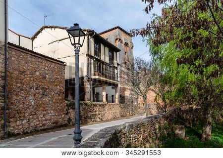 Picturesque View Of The Promenade Along The River Arlanza In The Village Of Covarrubias