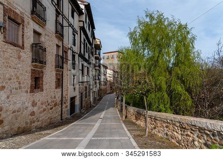 Picturesque View Of The Promenade Along The River Arlanza In The Village Of Covarrubias